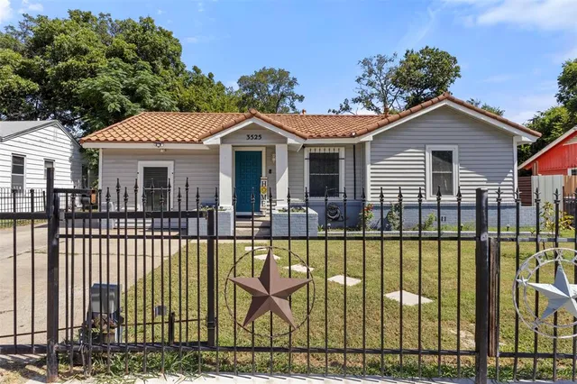 a view of a house with a outdoor seating