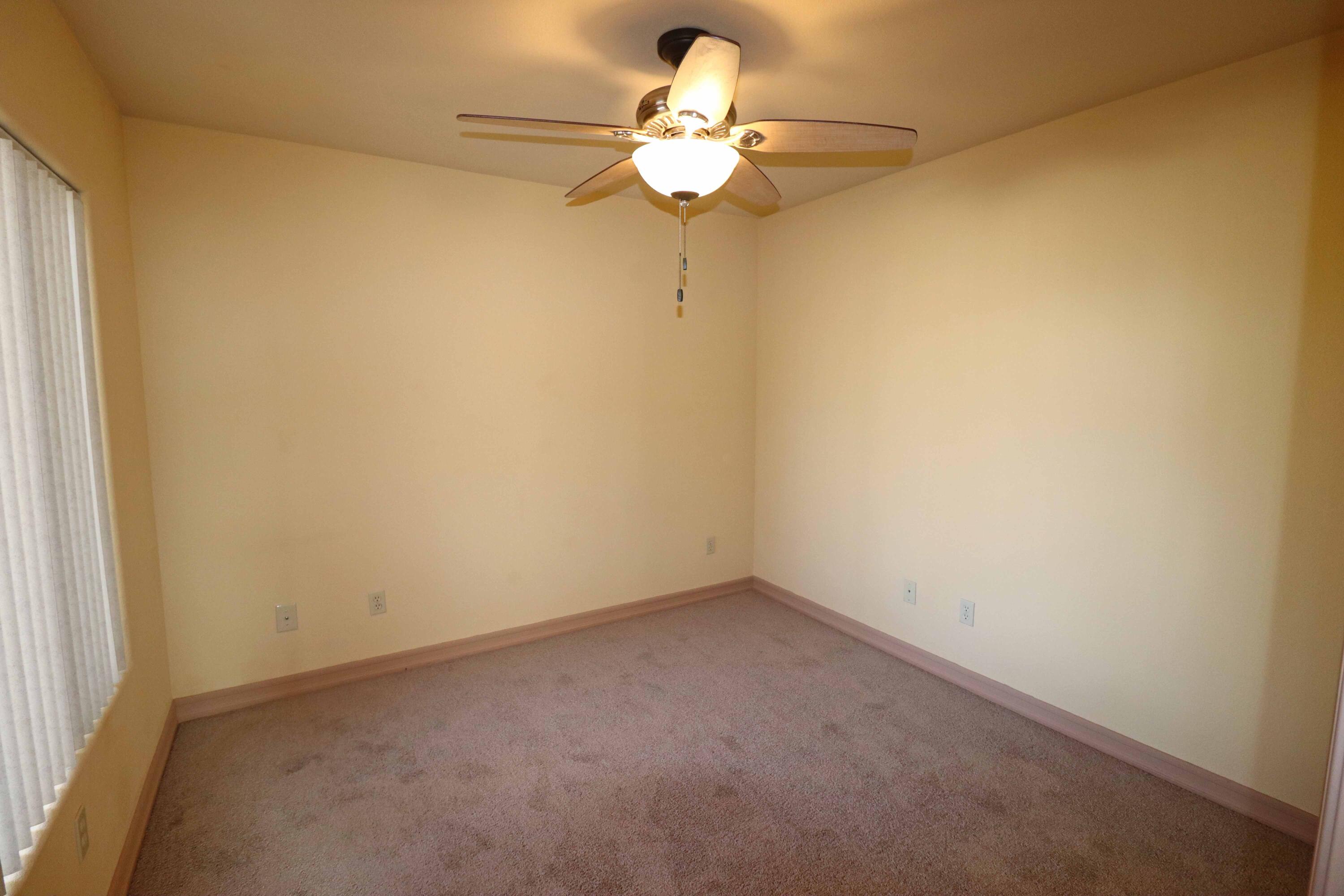 7201 Demesne Road Joshua Tree, CA 92252 - Photo 17 of 27 a very nice looking room with a fan