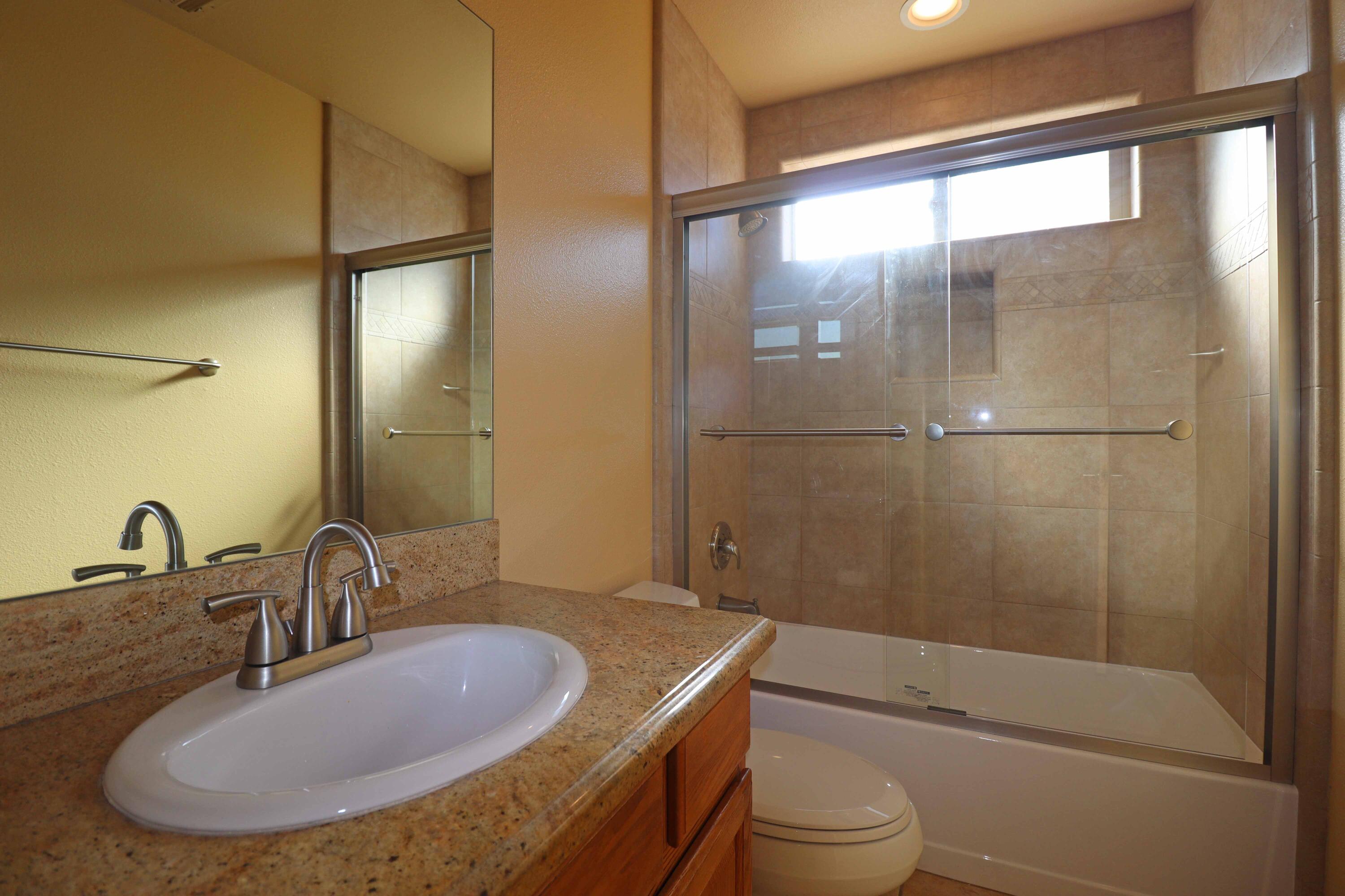 7201 Demesne Road Joshua Tree, CA 92252 - Photo 20 of 27 a bathroom with a sink toilet and shower