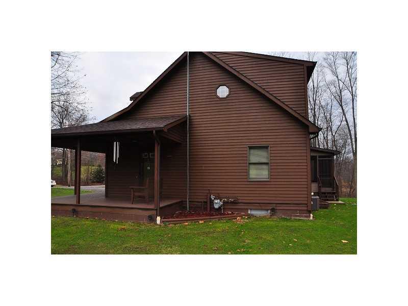 110 Wansack Road West Middlesex, PA 16159 - Photo 13 of 20 Exterior Front. SIDE PORCH ACCESSIBLE FROM BEDROOM