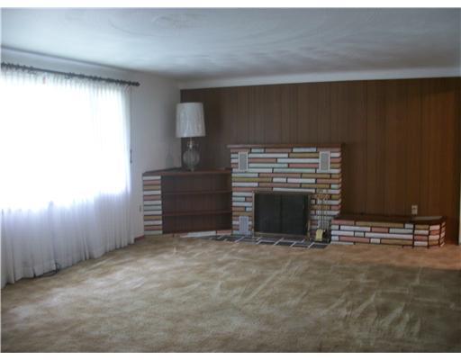 149 Rydle Road Mount Pleasant, PA 15666 - Photo 2 of 18 Living Room. Huge room, coved ceilings, plaster & fireplace.