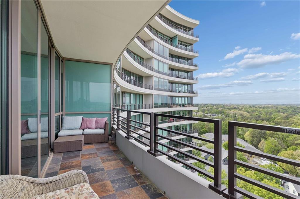 700 Park Regency Place Northeast, Unit 2002 Atlanta, GA 30326 - Photo 23 of 37 a view of balcony with furniture