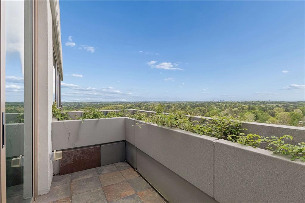 700 Park Regency Place Northeast, Unit 2002 Atlanta, GA 30326 - Photo 26 of 37 a view of an outdoor space with a ocean view