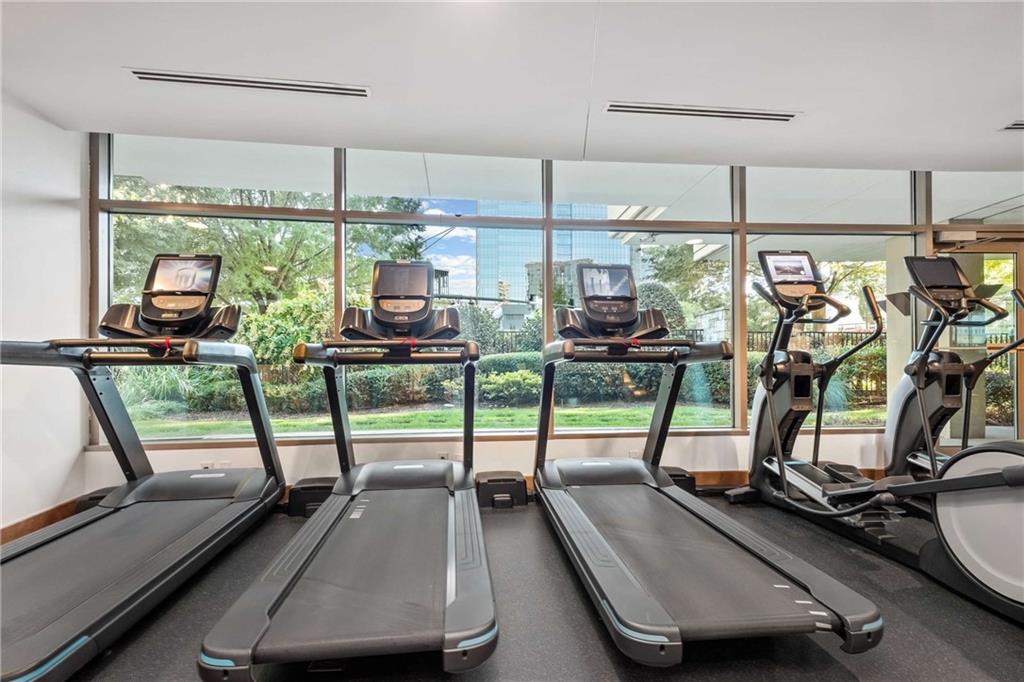 700 Park Regency Place Northeast, Unit 2002 Atlanta, GA 30326 - Photo 29 of 37 a view of a room with gym equipment