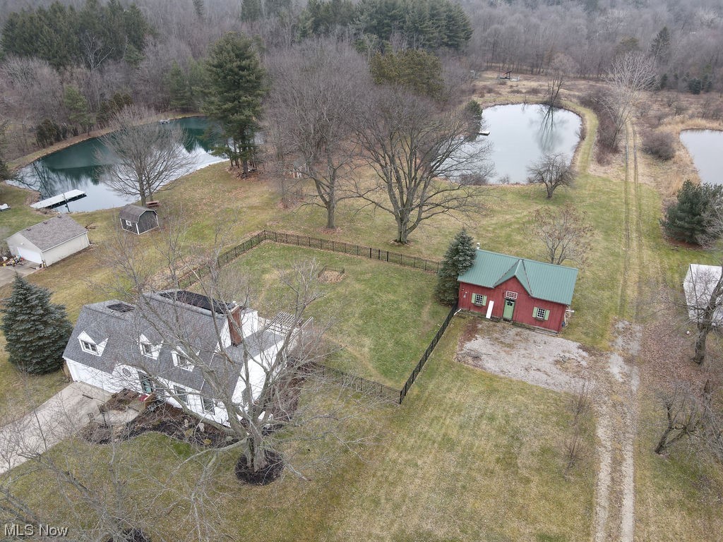 149 North Medina Line Road Akron, OH 44333 - Photo 3 of 36 The property features a fenced area, heated barn, and stocked pond.