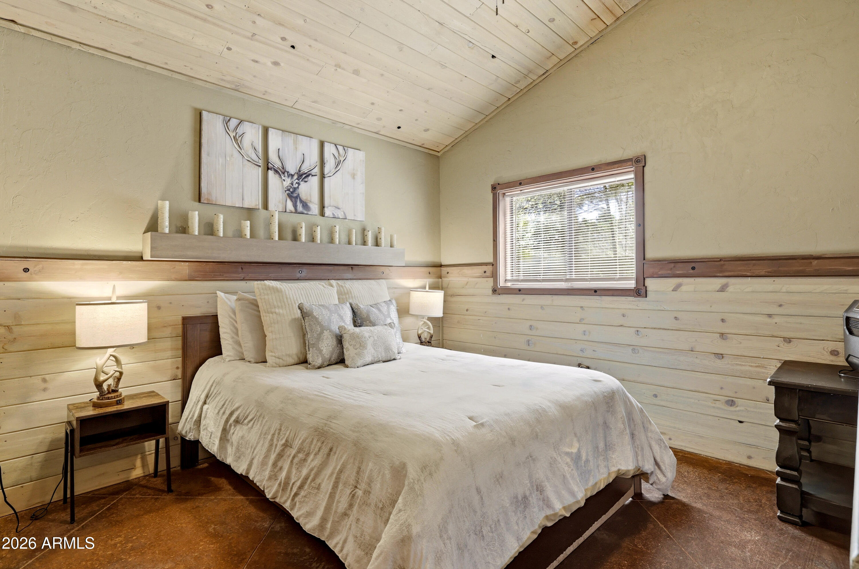 4971 Buck Springs Road Pinetop, AZ 85935 - Photo 14 of 32 a bedroom with a bed and a night stand