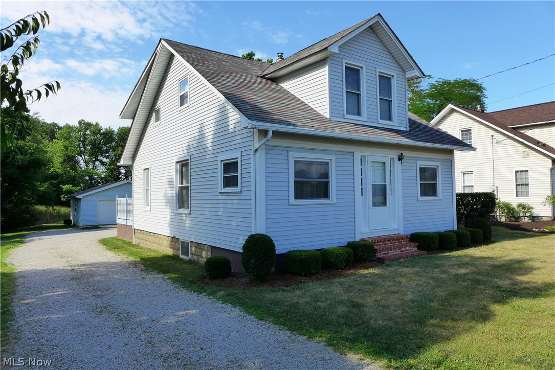 7811 North Ridge Road Madison, OH 44057 - Photo 2 of 24 There is a deep driveway and an oversized 2 1/2 car garage for plenty of storage.