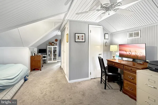 a view of entryway with livingroom