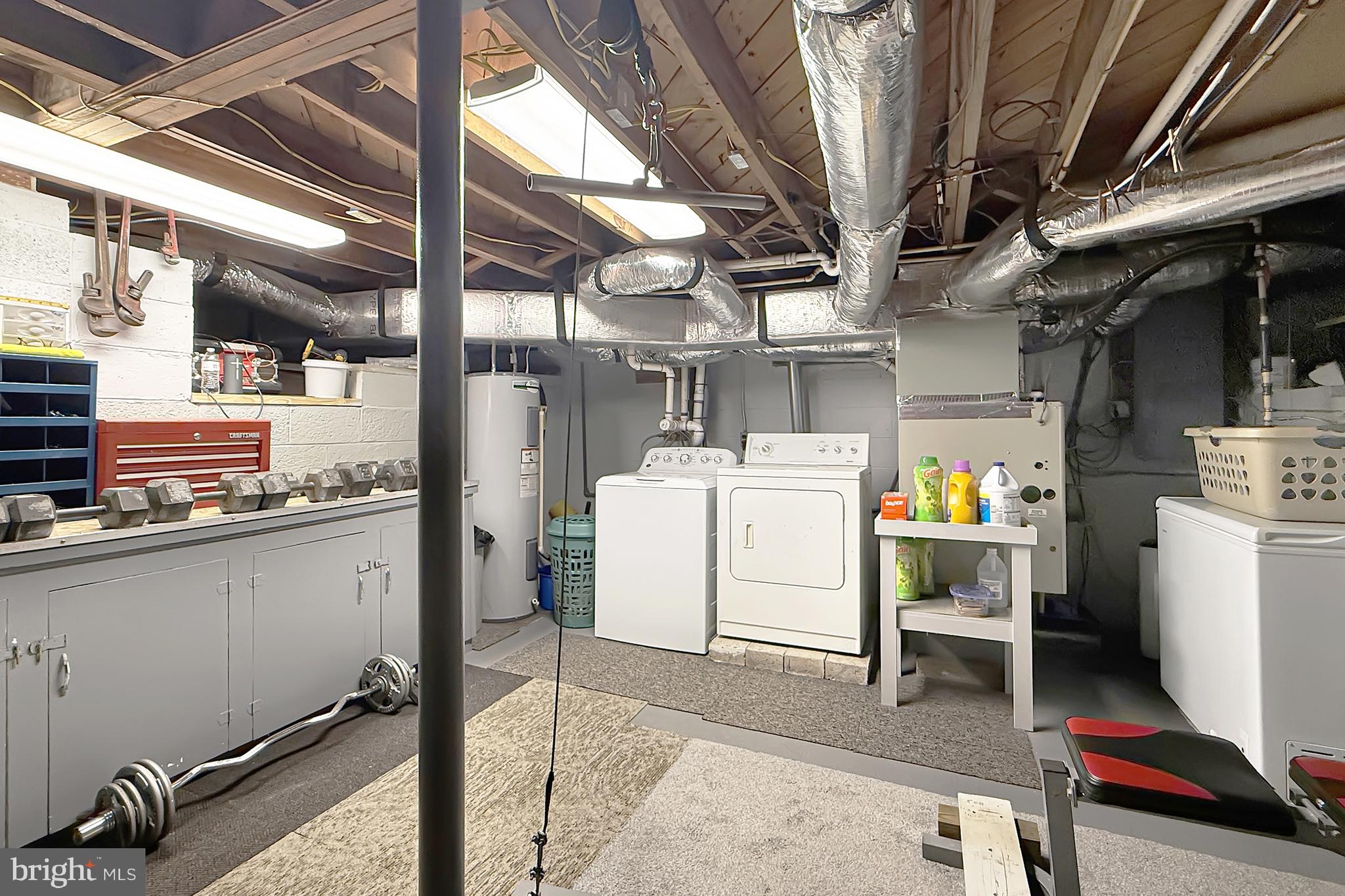 414 Conwell Street Milton, DE 19968 - Photo 20 of 22 Basement with Washer/ Dryer
