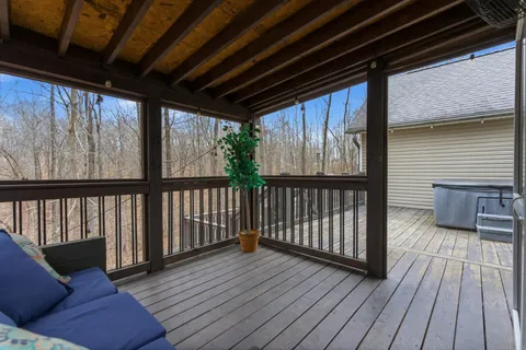 a view of a two chairs in the deck