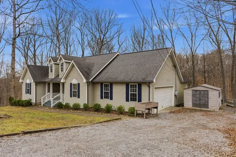 front view of a house with a yard