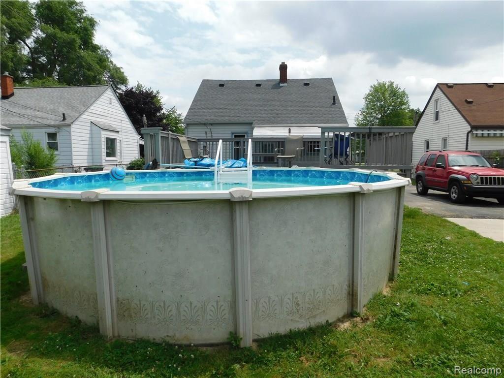 6570 Pelham Road Taylor, MI 48180 - Photo 35 of 36 ABOVE GROUND POOL WITH LARGE DECK