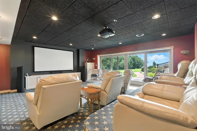 a bed room with a bed window and a television