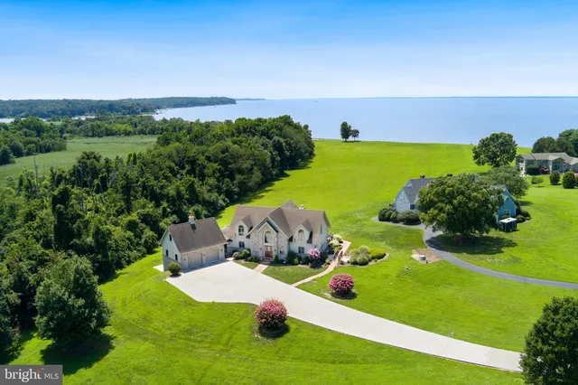 a view of a table and chairs in the garden
