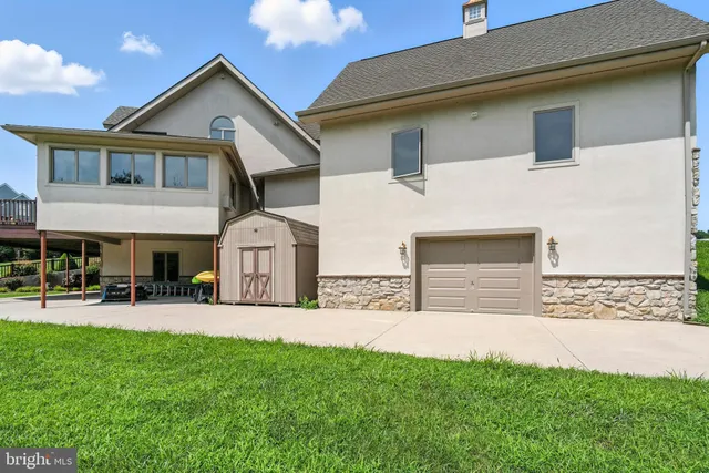 a view of a backyard of the house