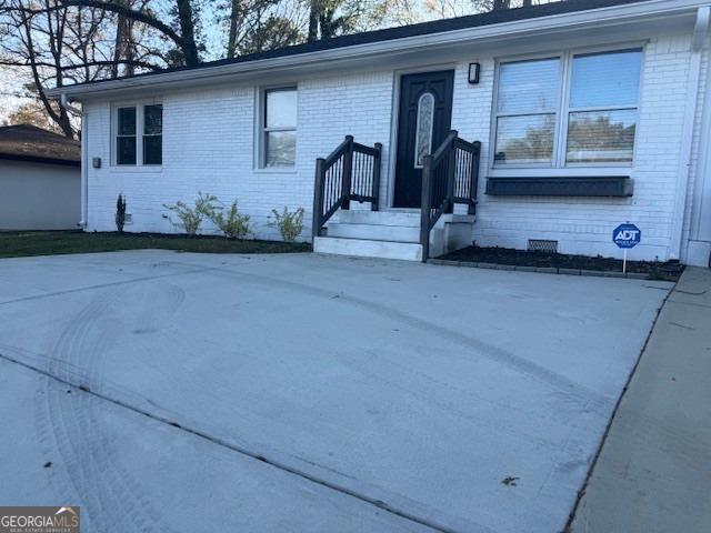 2899 Gresham Rd S East Atlanta, GA 30316 - Photo 2 of 17 a view of front door and potted plants