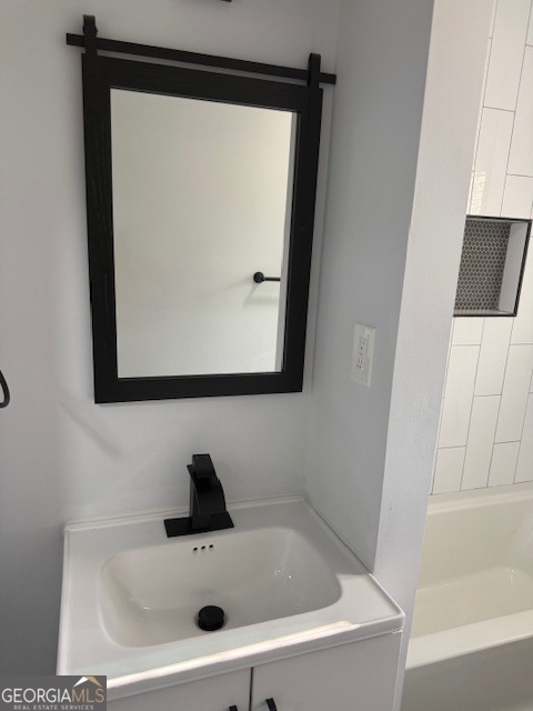 2899 Gresham Rd S East Atlanta, GA 30316 - Photo 7 of 17 a bathroom with a sink and a mirror