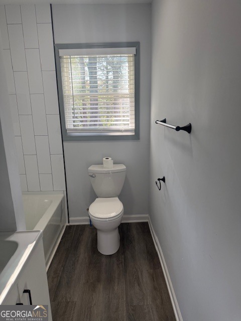 2899 Gresham Rd S East Atlanta, GA 30316 - Photo 8 of 17 a white toilet sitting next to a bathroom sink