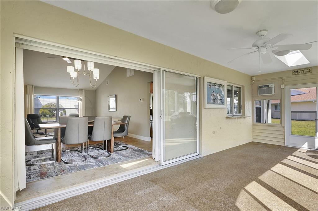 112 Versailles Circle Naples, FL 34112 - Photo 27 of 50 a view of a livingroom with furniture and windows