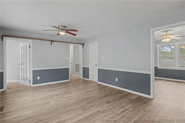 a view of kitchen with wooden floor