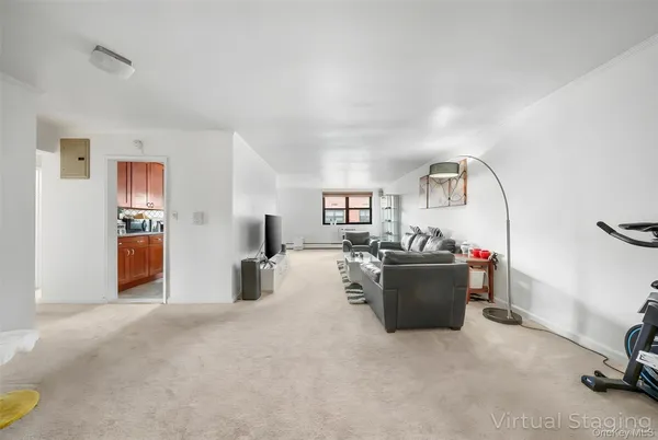 a view of a livingroom with furniture and storage