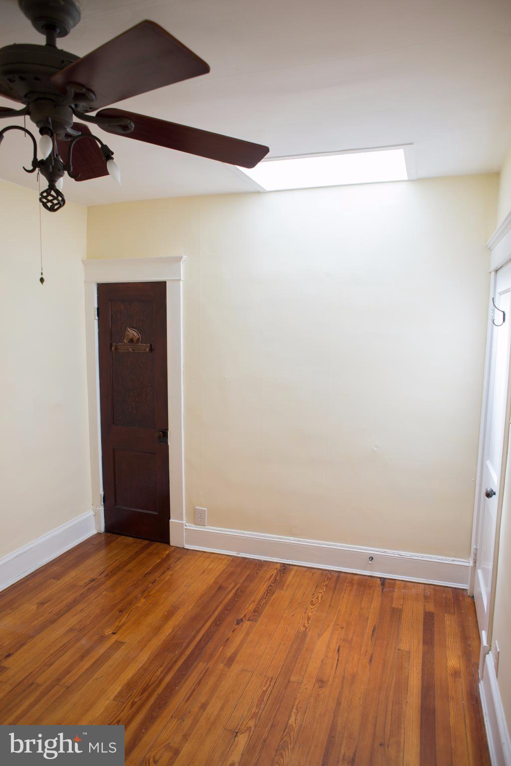 3652 Keswick Road Baltimore, MD 21211 - Photo 12 of 16 a view of a room with wooden floor and wooden floor