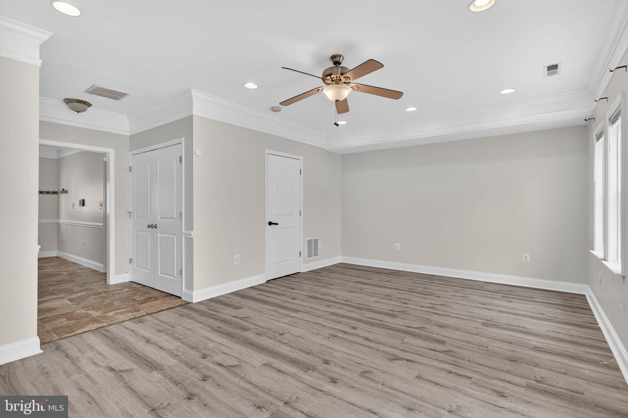 1125 Race Street Baltimore, MD 21230 - Photo 25 of 43 a view of an empty room and wooden floor