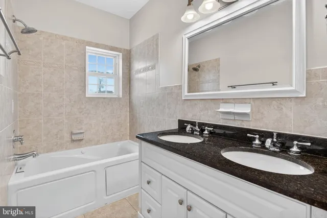 a bathroom with a sink and a bathtub