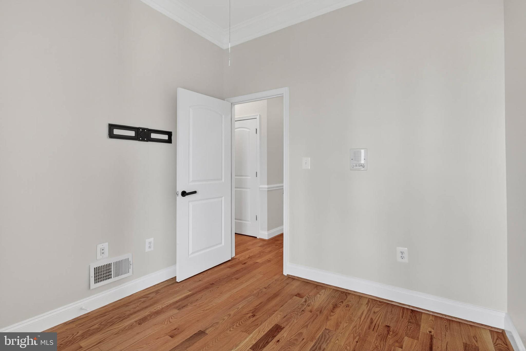 1125 Race Street Baltimore, MD 21230 - Photo 35 of 43 wooden floor in an empty room