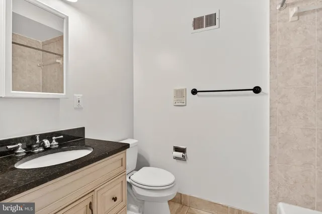 a bathroom with a sink and a toilet