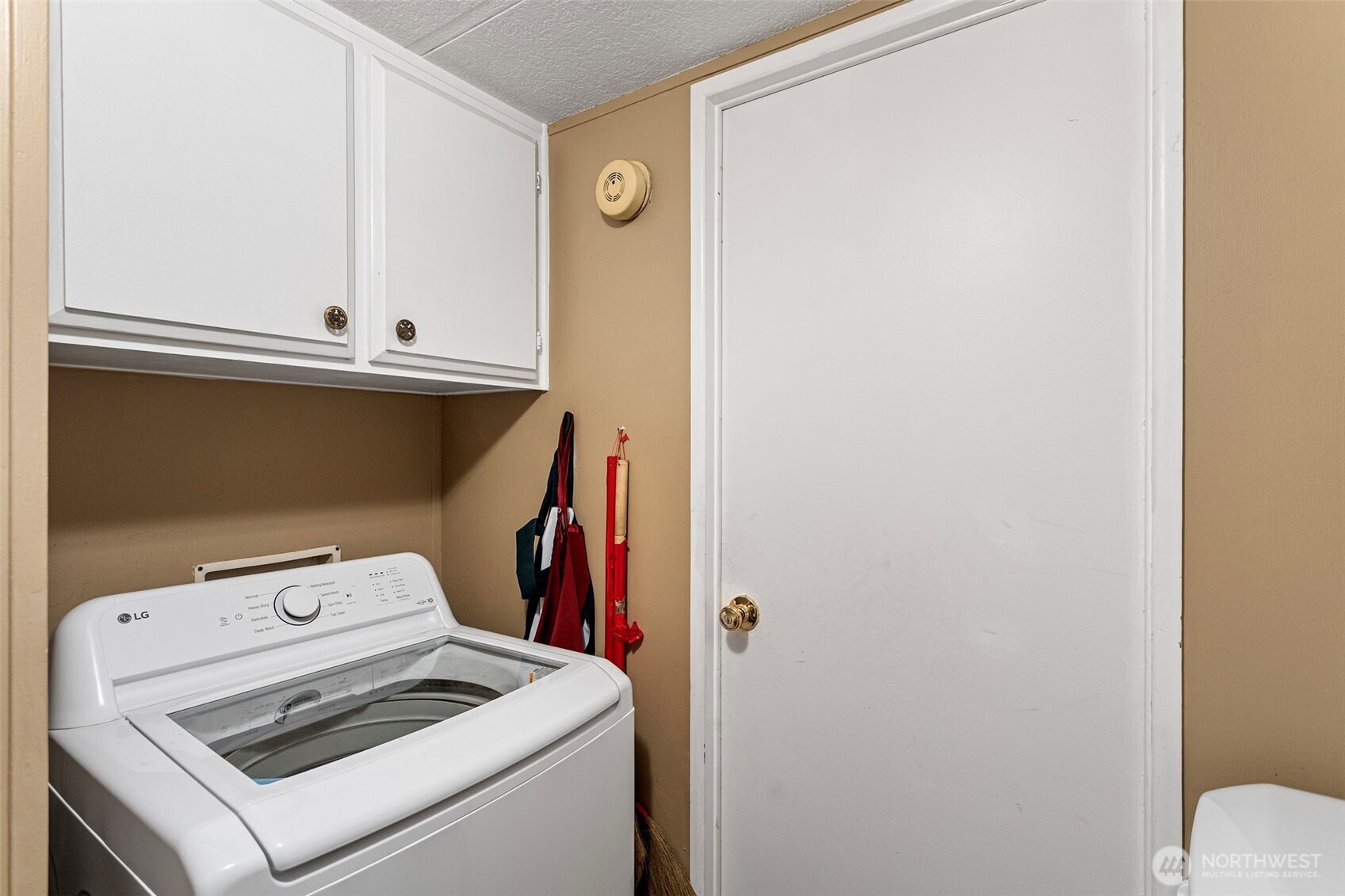 375 Union Avenue Southeast, Unit 46 Renton, WA 98059 - Photo 17 of 17 a utility room with dryer and washer
