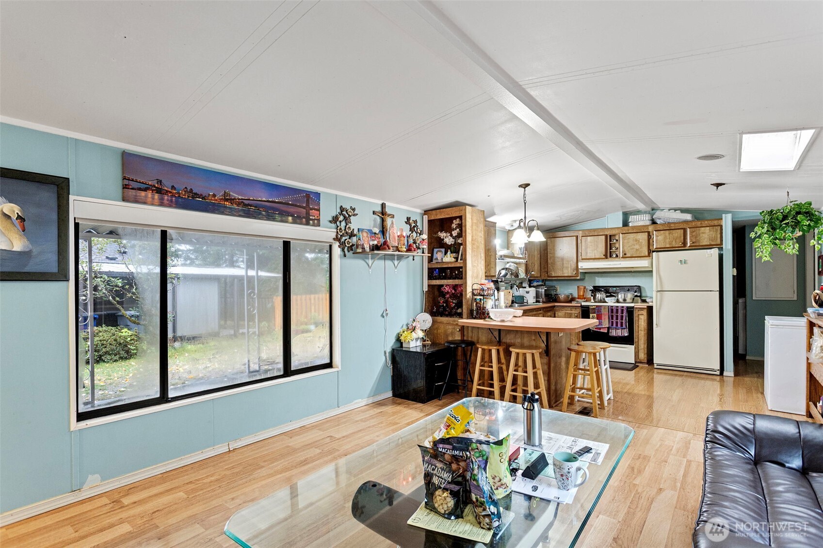 375 Union Avenue Southeast, Unit 46 Renton, WA 98059 - Photo 4 of 17 a living room with furniture and wooden floor