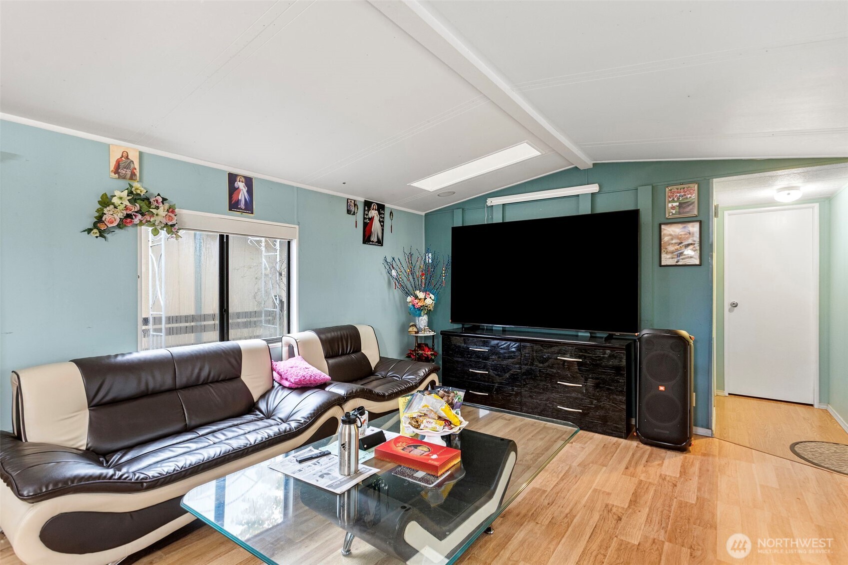 375 Union Avenue Southeast, Unit 46 Renton, WA 98059 - Photo 5 of 17 a living room with furniture and a flat screen tv