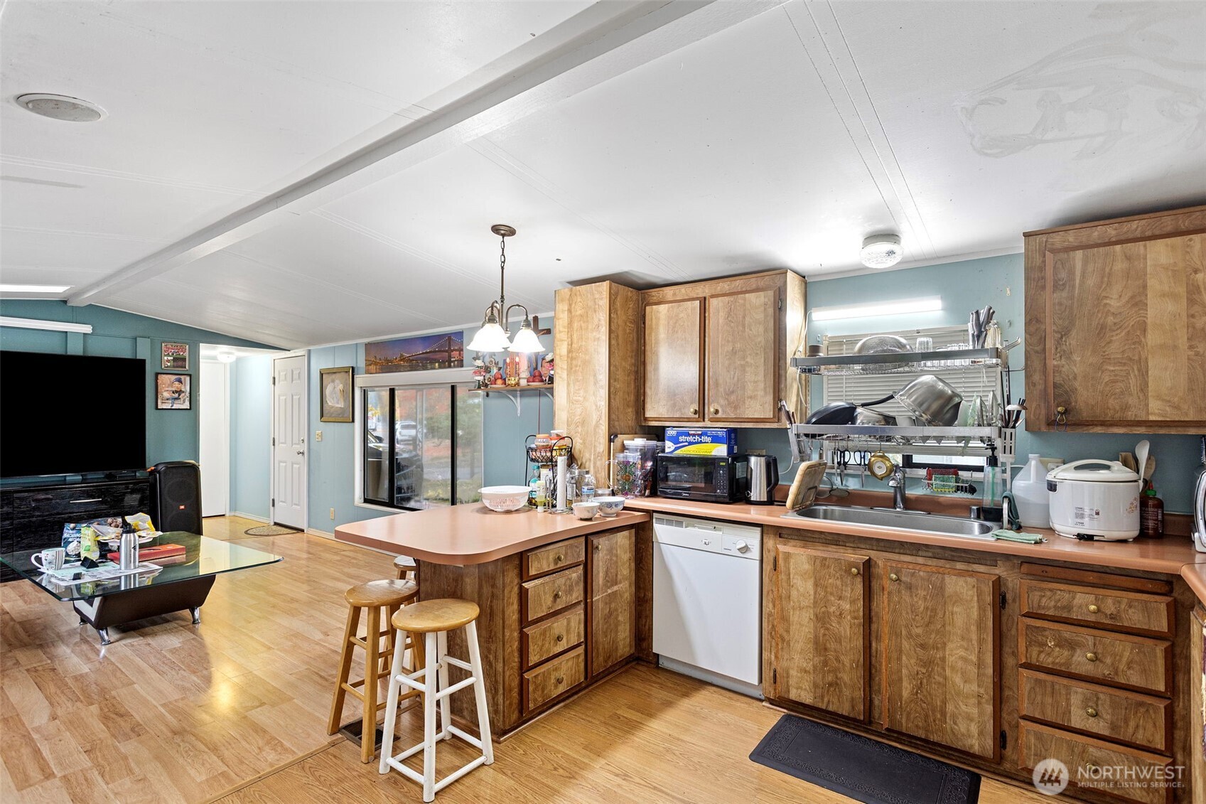 375 Union Avenue Southeast, Unit 46 Renton, WA 98059 - Photo 9 of 17 a kitchen with a sink appliances and cabinets