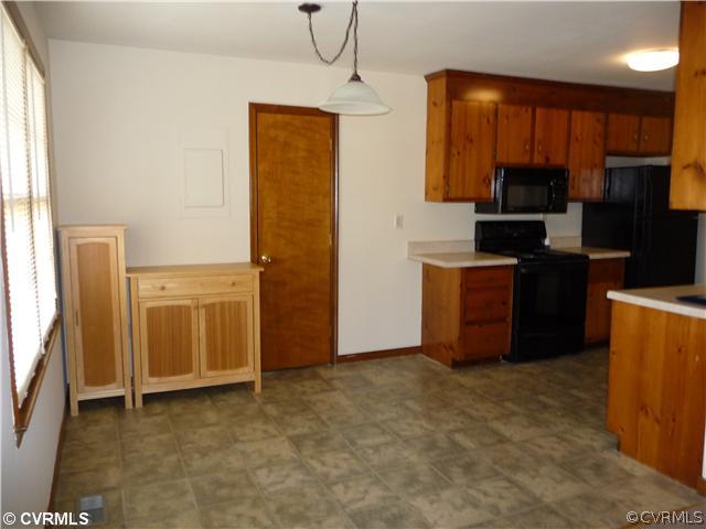 7701 Drexelbrook Road Chesterfield, VA 23832 - Photo 3 of 12 a kitchen with sink and refrigerator