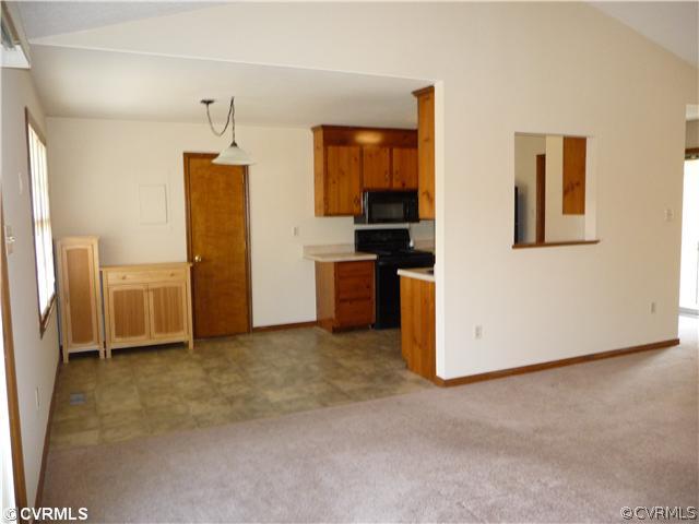 7701 Drexelbrook Road Chesterfield, VA 23832 - Photo 8 of 12 a view of a kitchen with refrigerator and cabinet