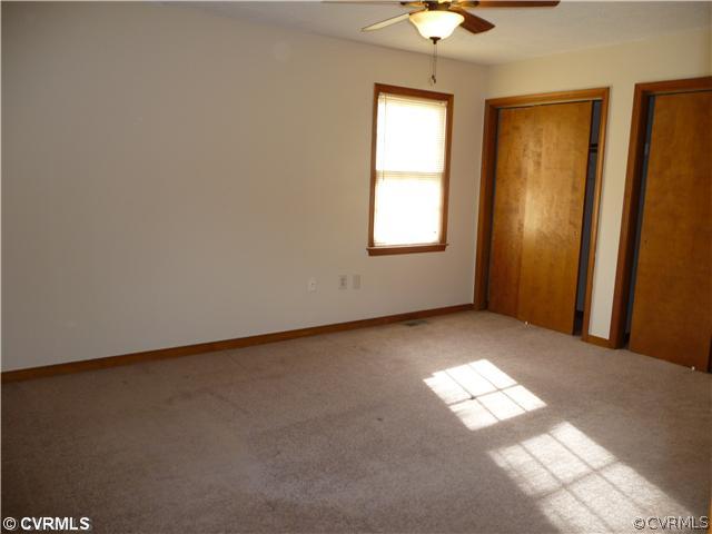 7701 Drexelbrook Road Chesterfield, VA 23832 - Photo 9 of 12 an empty room with windows and closet