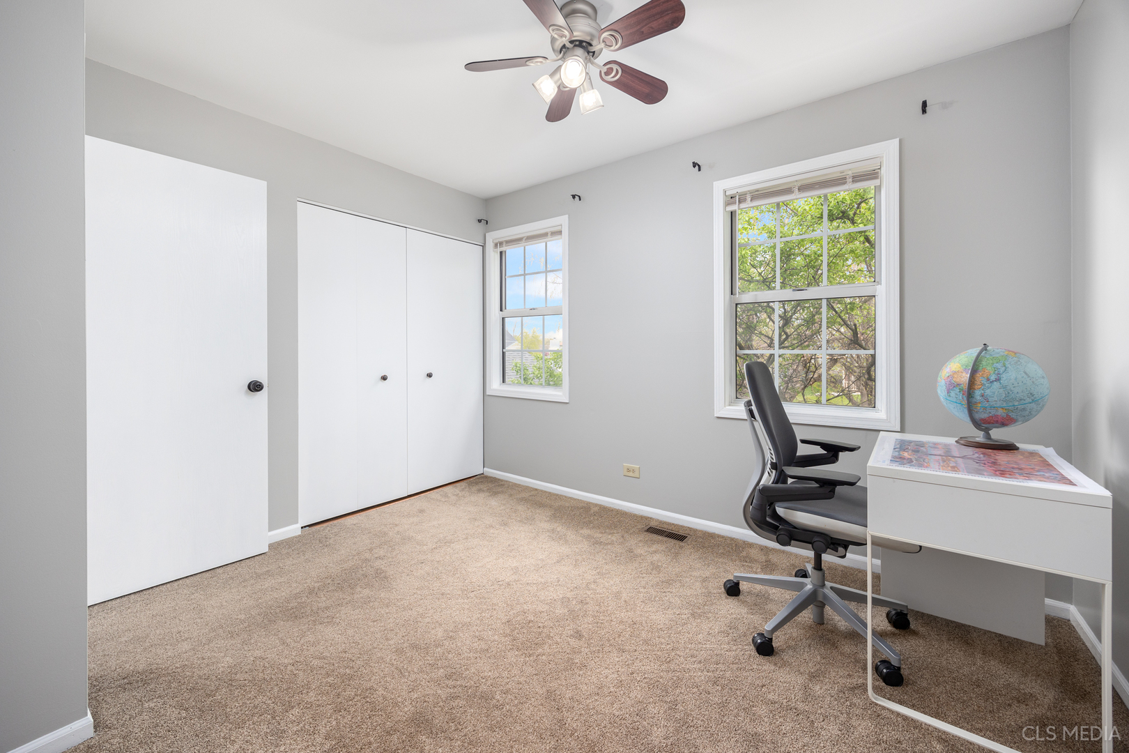 658 Cutter Lane Elk Grove Village, IL 60007 - Photo 17 of 33 a view of a workspace with furniture and a window
