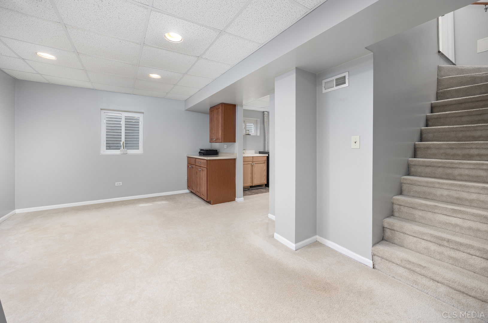 658 Cutter Lane Elk Grove Village, IL 60007 - Photo 21 of 33 an empty room with wooden floor and windows