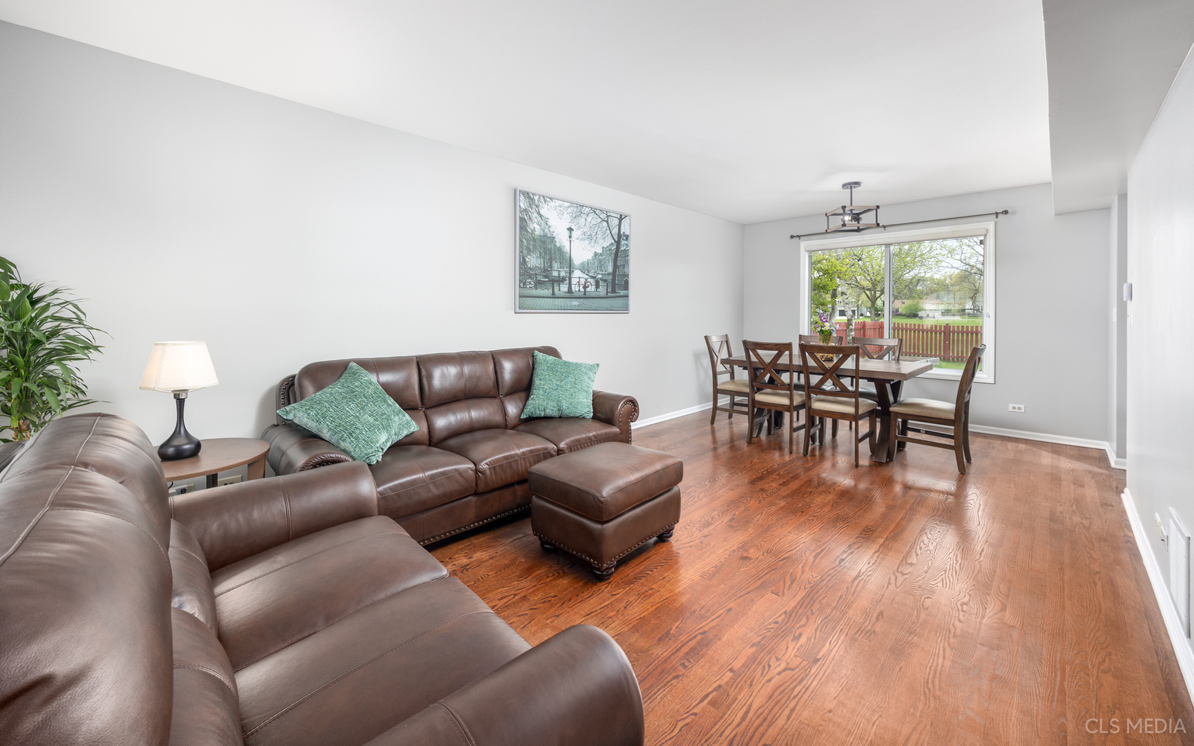 658 Cutter Lane Elk Grove Village, IL 60007 - Photo 3 of 33 a living room with furniture and wooden floor