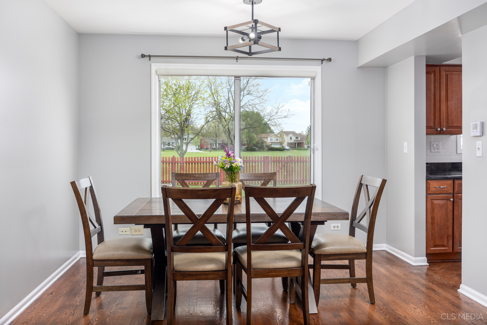 658 Cutter Lane Elk Grove Village, IL 60007 - Photo 5 of 33 a view of a dining room with furniture window and wooden floor