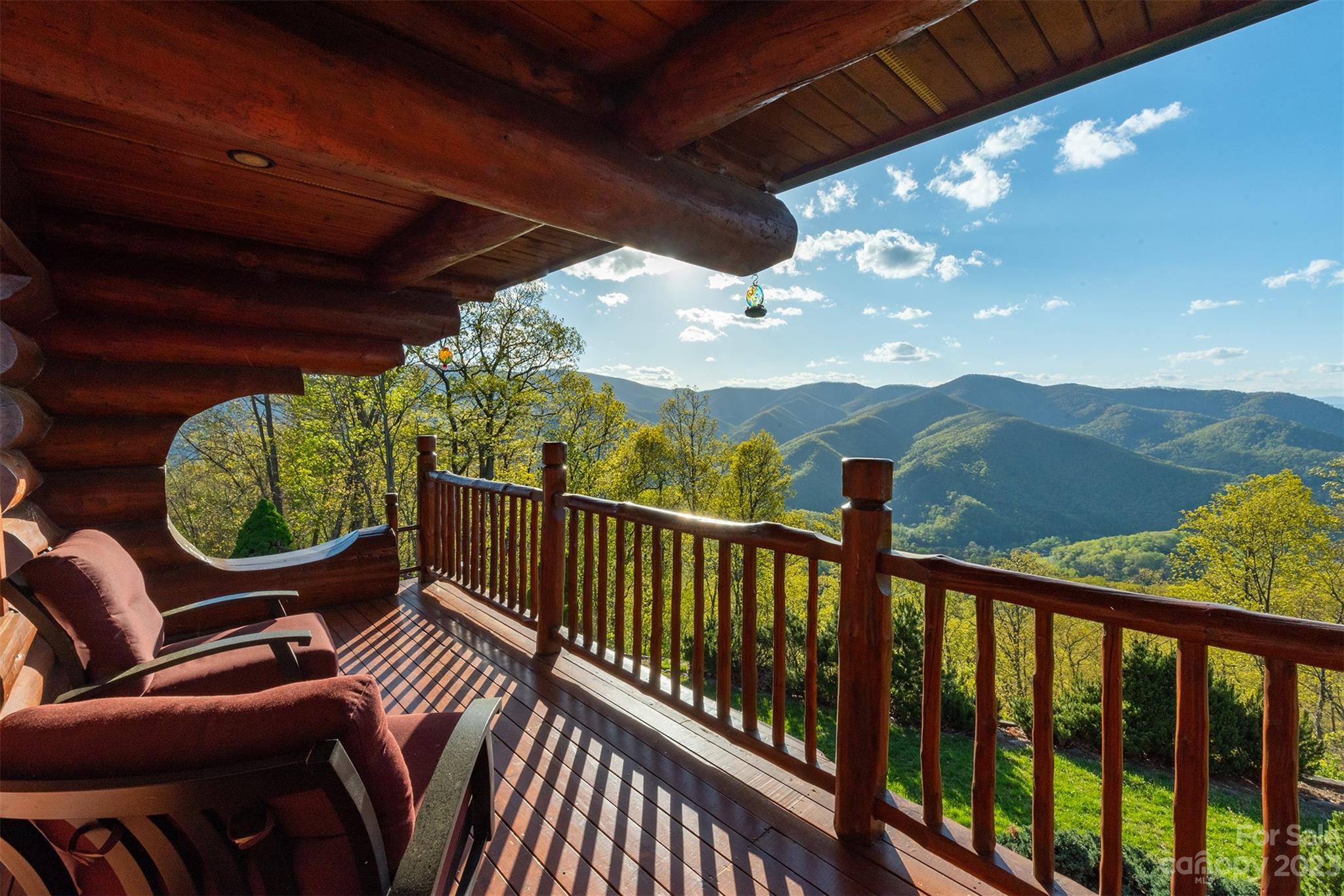 a view of balcony with furniture