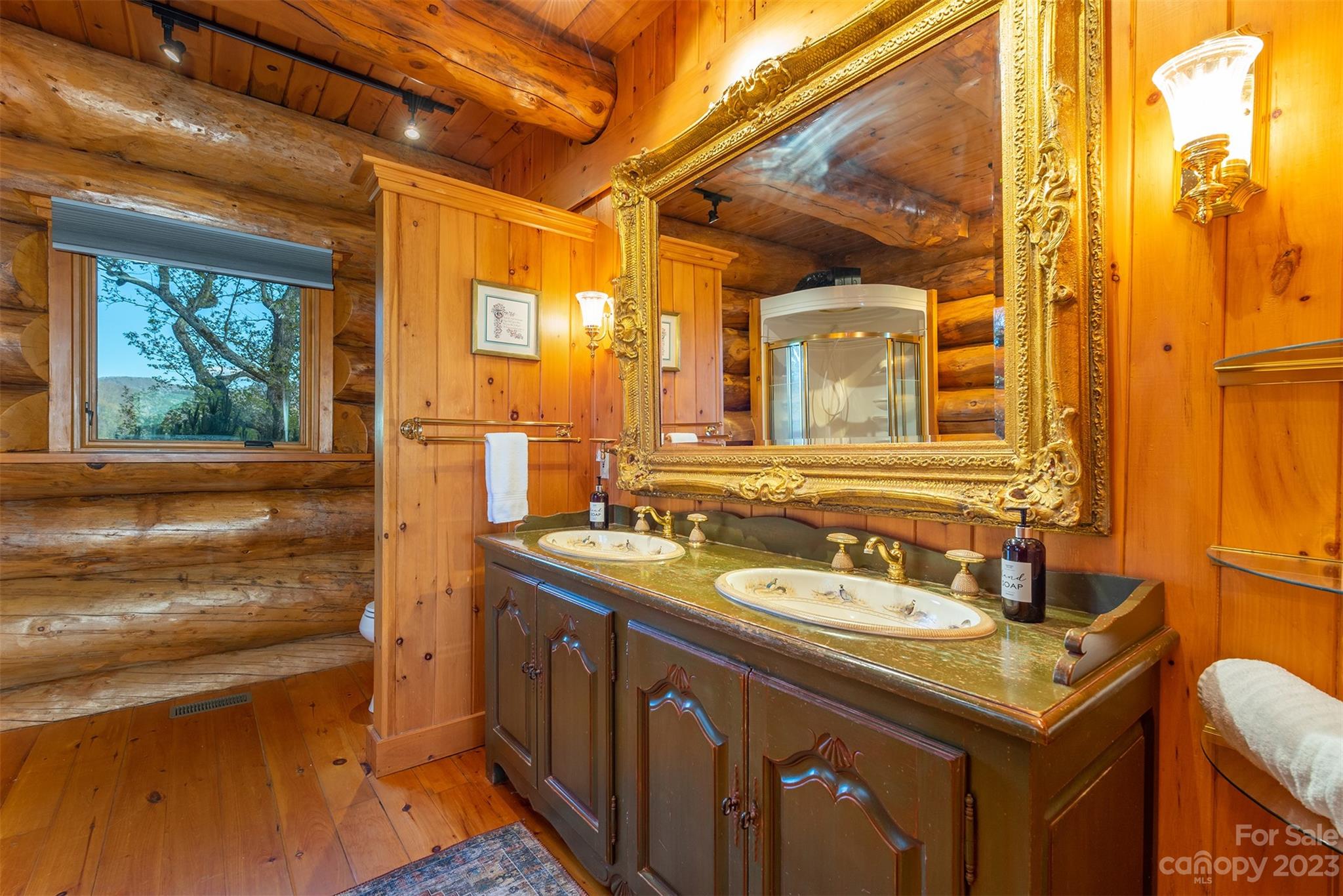 685 Talbot Drive Canton, NC 28716 - Photo 15 of 48 a bathroom with a sink and a mirror