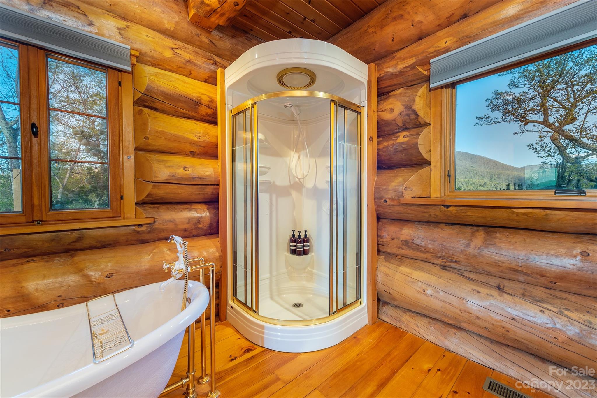 685 Talbot Drive Canton, NC 28716 - Photo 16 of 48 a view of a balcony with door and wooden floor