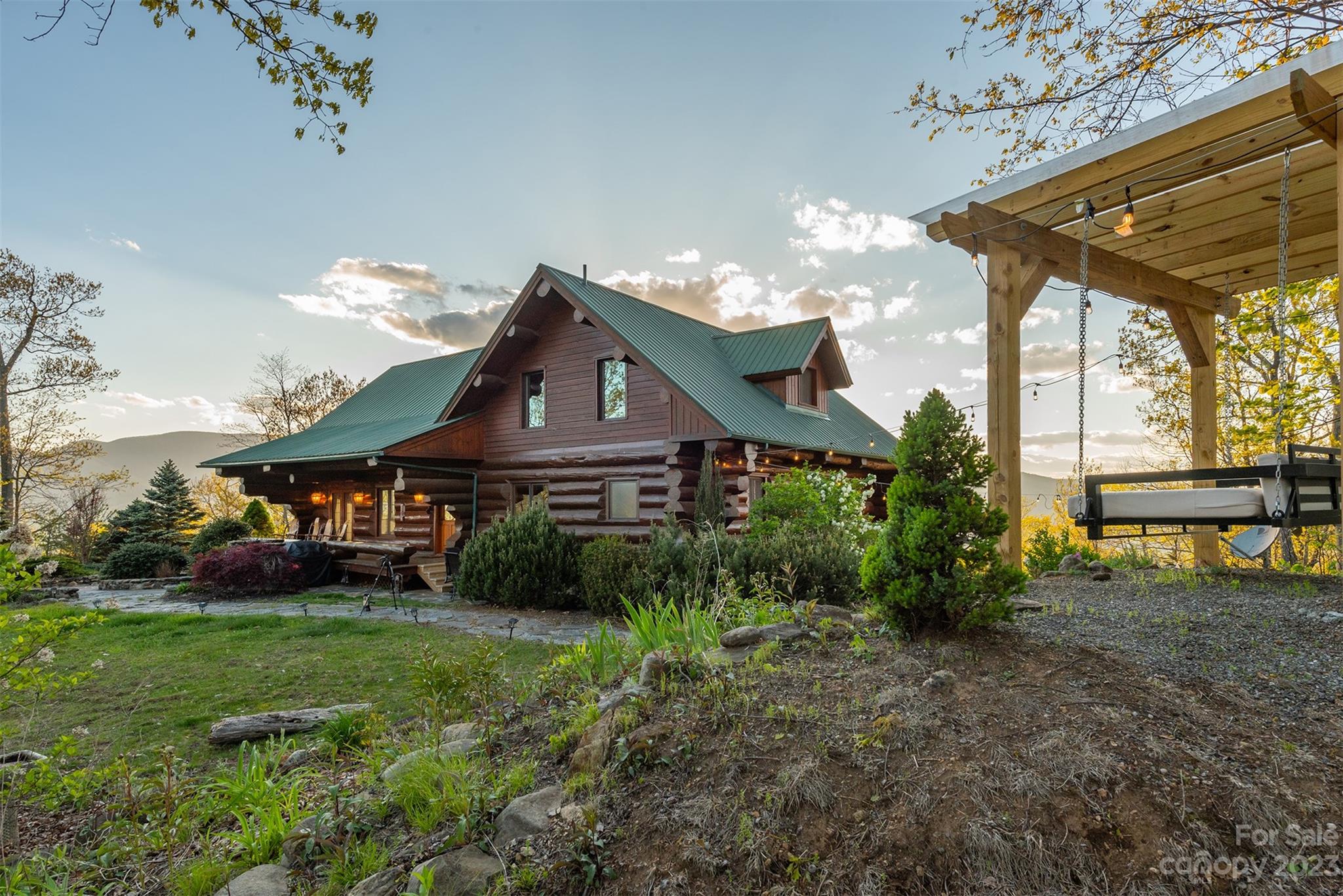685 Talbot Drive Canton, NC 28716 - Photo 40 of 48 a front view of a house with garden