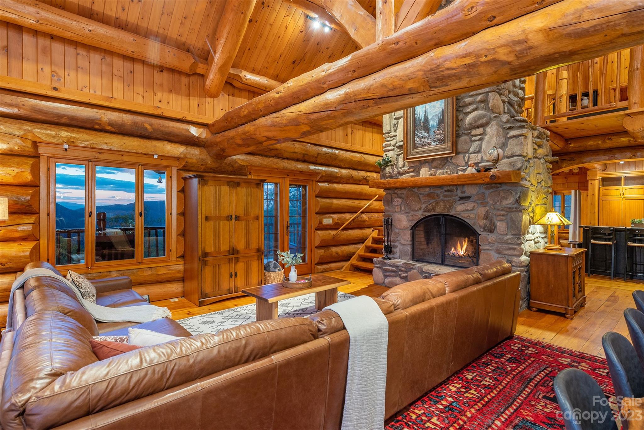 685 Talbot Drive Canton, NC 28716 - Photo 47 of 48 a living room with furniture and a fireplace