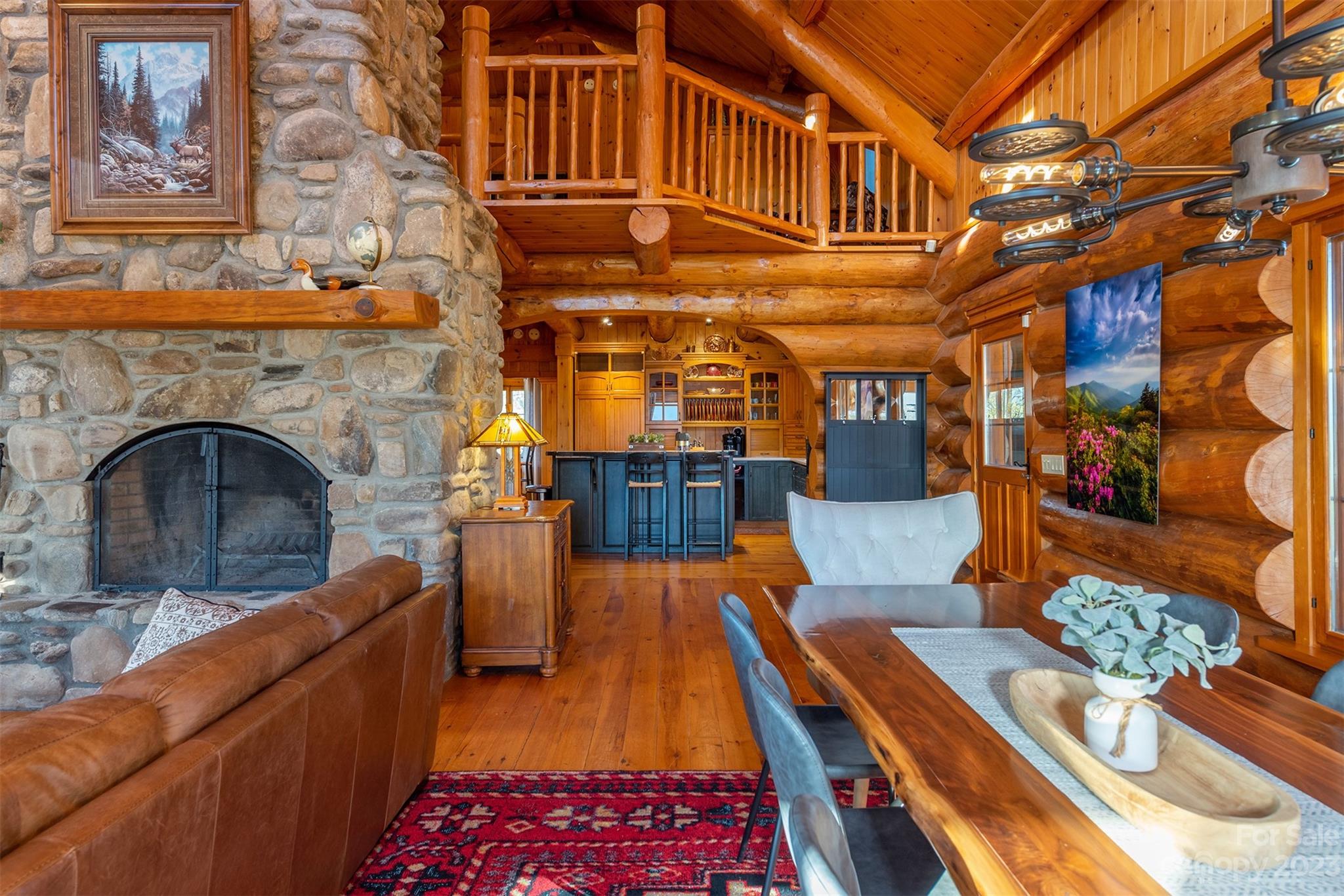 685 Talbot Drive Canton, NC 28716 - Photo 7 of 48 a view of a patio with couches chairs and a fireplace