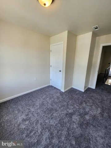 a bathroom with a sink a toilet and bathtub