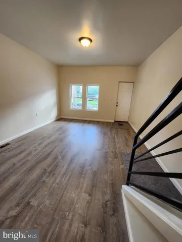 a kitchen with a stove and a microwave