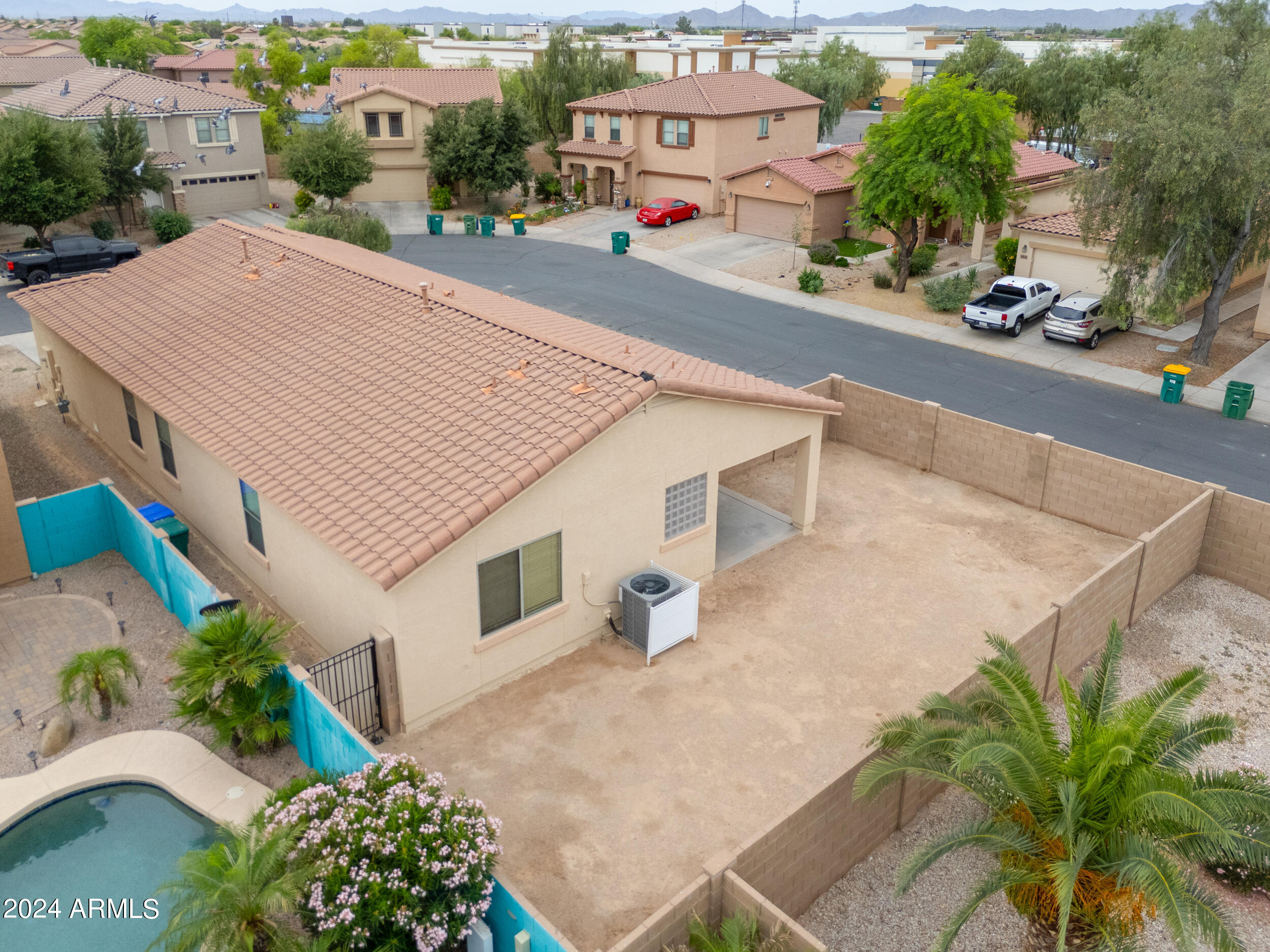 44236 Roth Road Maricopa, AZ 85138 - Photo 38 of 45 an aerial view of a house with a yard and potted plants